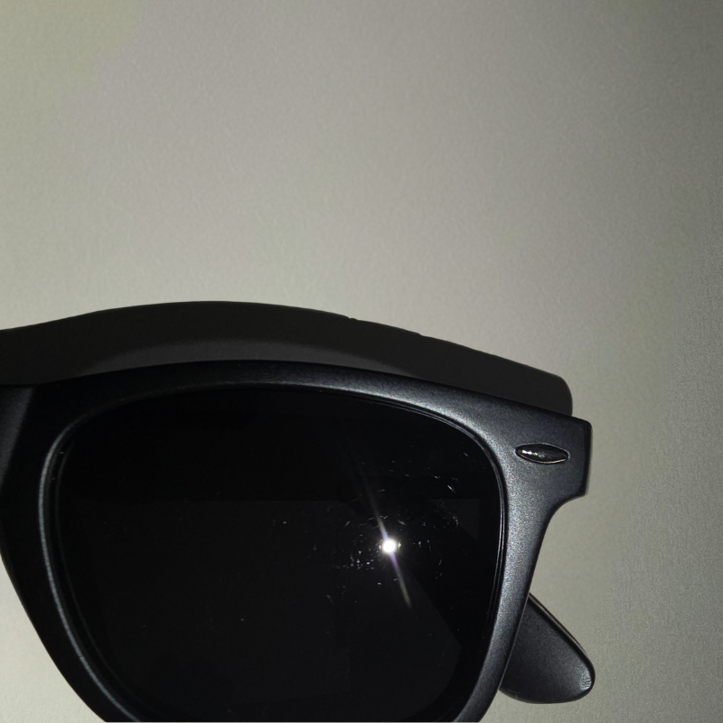 Close up image of the BLK-01, a matte black pair from Kimchi Buritto Sunglasses