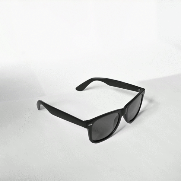 Matte black sunglasses with a classic square frames on a neutral background.